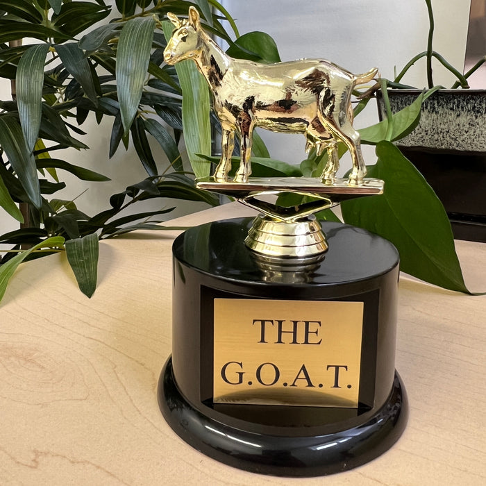 Our funny trophy reads The GOAT and is a great award for any event.