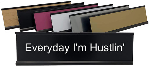 Everyday I'm Hustlin' funny desk name plate in black with white writing.
