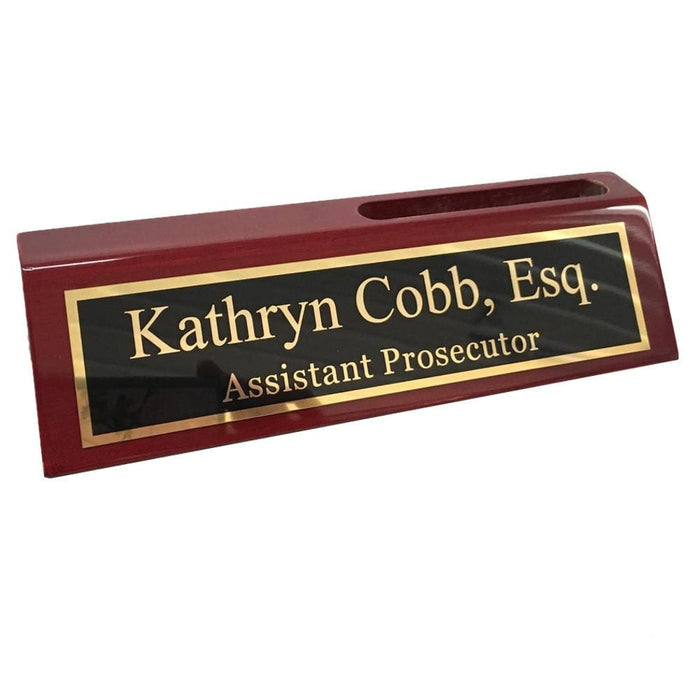 Two lines engraved on name plate for desk.