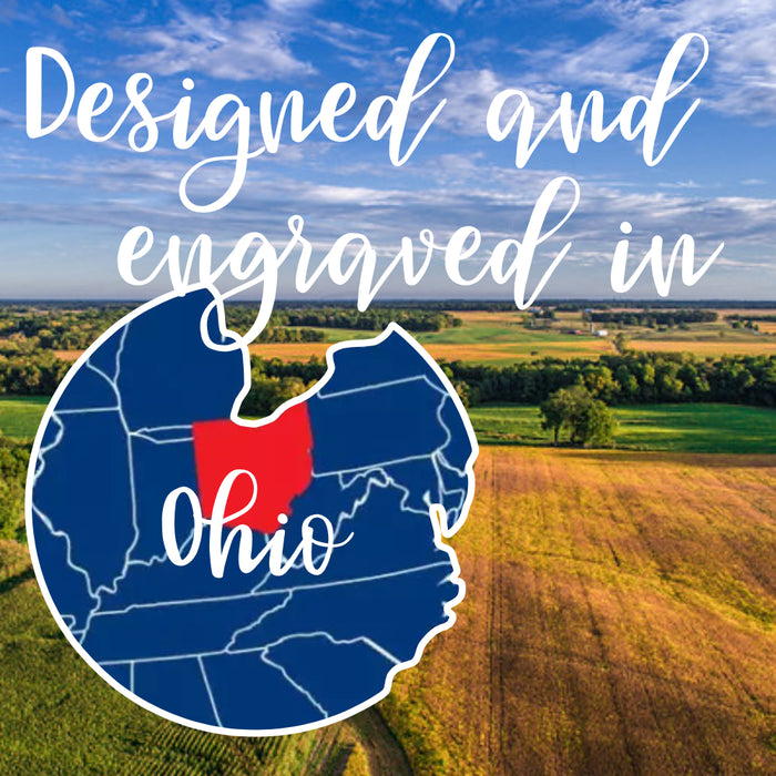 Map of Ohio with text 'Designed and engraved in Ohio' over a scenic landscape.