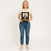 Person holding a framed photo plaque against a plain background