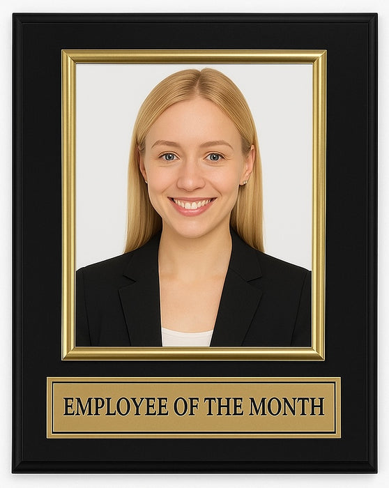 Framed photo of a woman with 'Employee of the Month' plaque