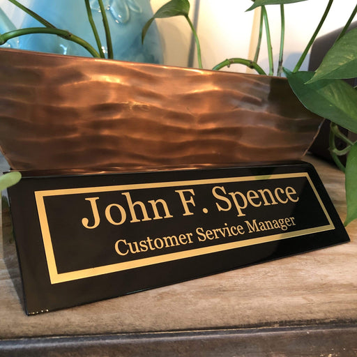 Desk name plates in gloss black piano finish add elegance to any office setting.