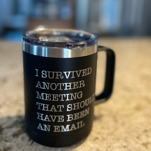 I Survived Another Meeting Mug shown in black.
