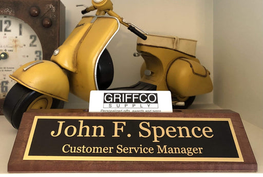 Desk name plate is solid wood and made in American from start to finish.
