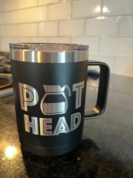 Pot Head 15 ounce Stainless Steel Insulated Coffee Mug on kitchen counter.